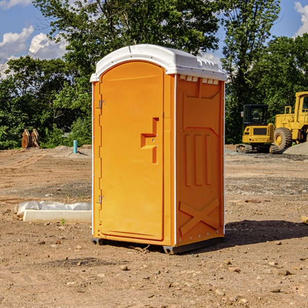 what is the cost difference between standard and deluxe portable toilet rentals in Byron